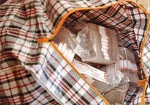 Дерзкое ограбление в Чугуеве. Неизвестные среди бела дня вырвали из рук бухгалтера частной фирмы сумку с тремястами тысяч гривен