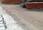 Снег сходит вместе с асфальтом. Из-подо льда и снега на харьковских дорогах обнажаются ямы