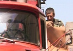 В Великом Бурлуке пожарные вынесли из огня двух детей