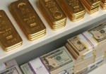 Золотовалютные резервы Нацбанка сократились на 8,4% за месяц