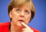 Меркель может встретиться с Балутой и Кернесом