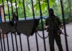 СНБО: Боевики на Донбассе грабят банки и берут людей в заложники