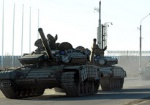 Украинские военные начали отвод тяжелого вооружения