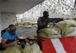 СНБО: Террористы продолжают провокации, ранены 8 военных