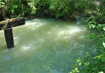 В реку Роганка сливают отходы производства