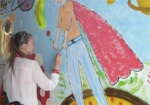 В арке дома на улице Рымарской дети нарисовали картину