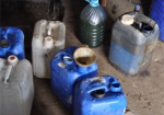 На Харьковщине нашли склад фальсифицированных нефтепродуктов, закопанных под землей