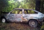 В Изюме машина загорелась на ходу: двое пострадавших