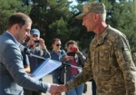 Почти 160 бойцов 92-й бригады получили документы на землю под Харьковом